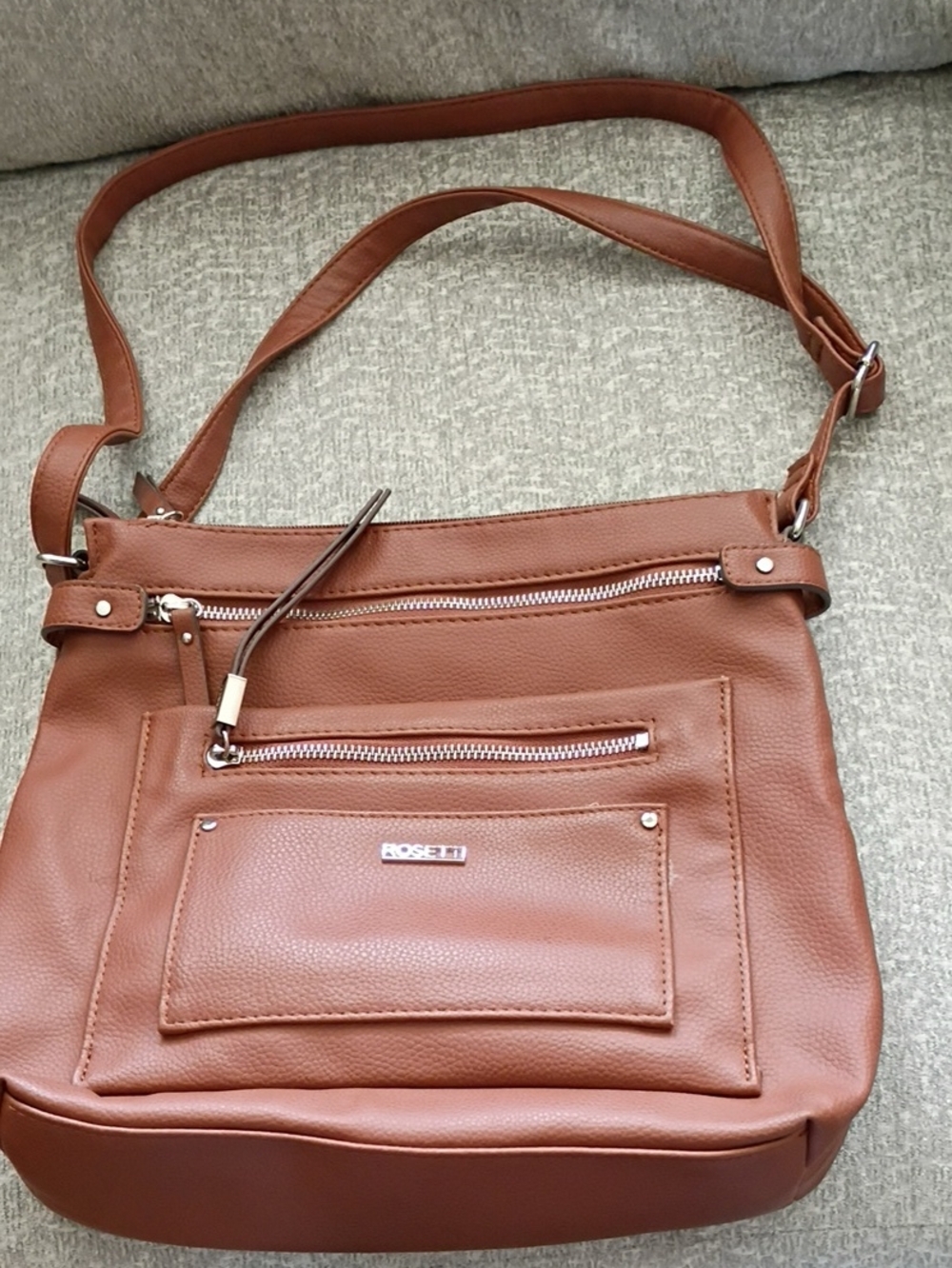 Rosetti Tan/Brown Crossbody Bag with Front Zip Pockets